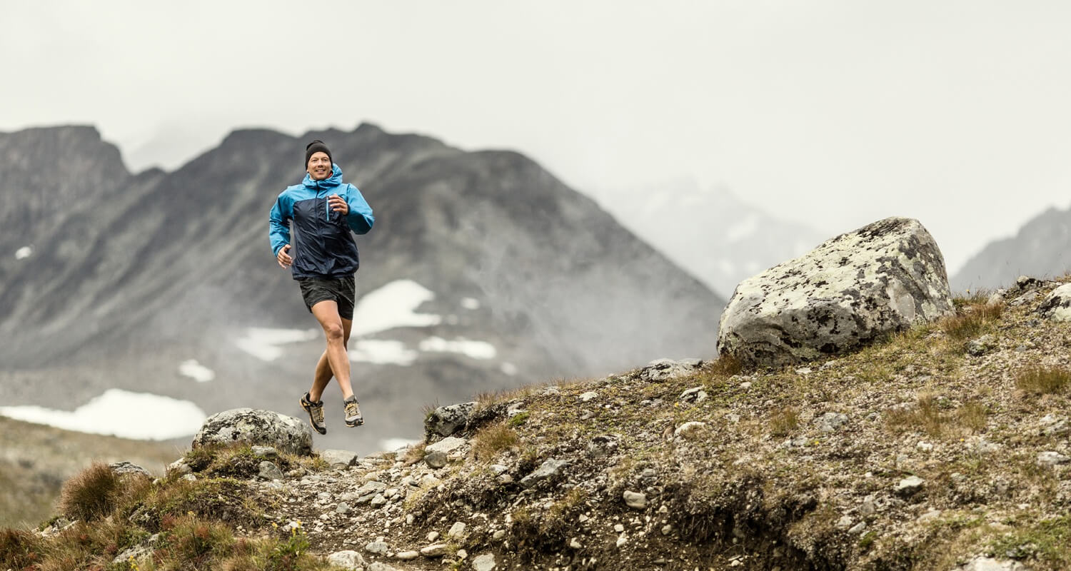 Man running in the mointains.