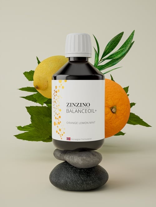 Zinzino BalanceOil+ bottle in orange lemon mint flavor, styled with citrus fruits and mint leaves for a fresh, natural look