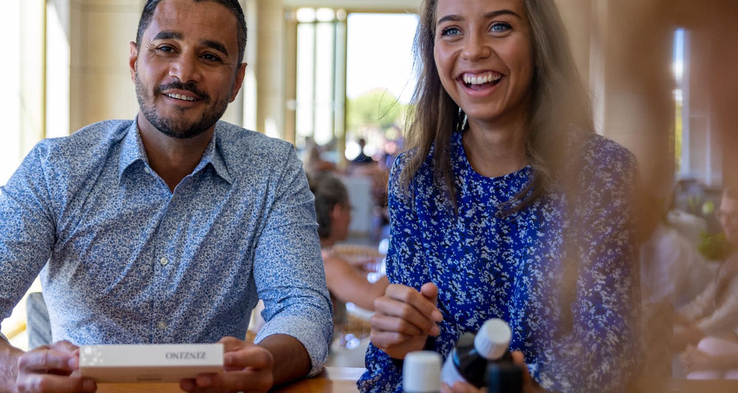 couple with balanceoil bottle